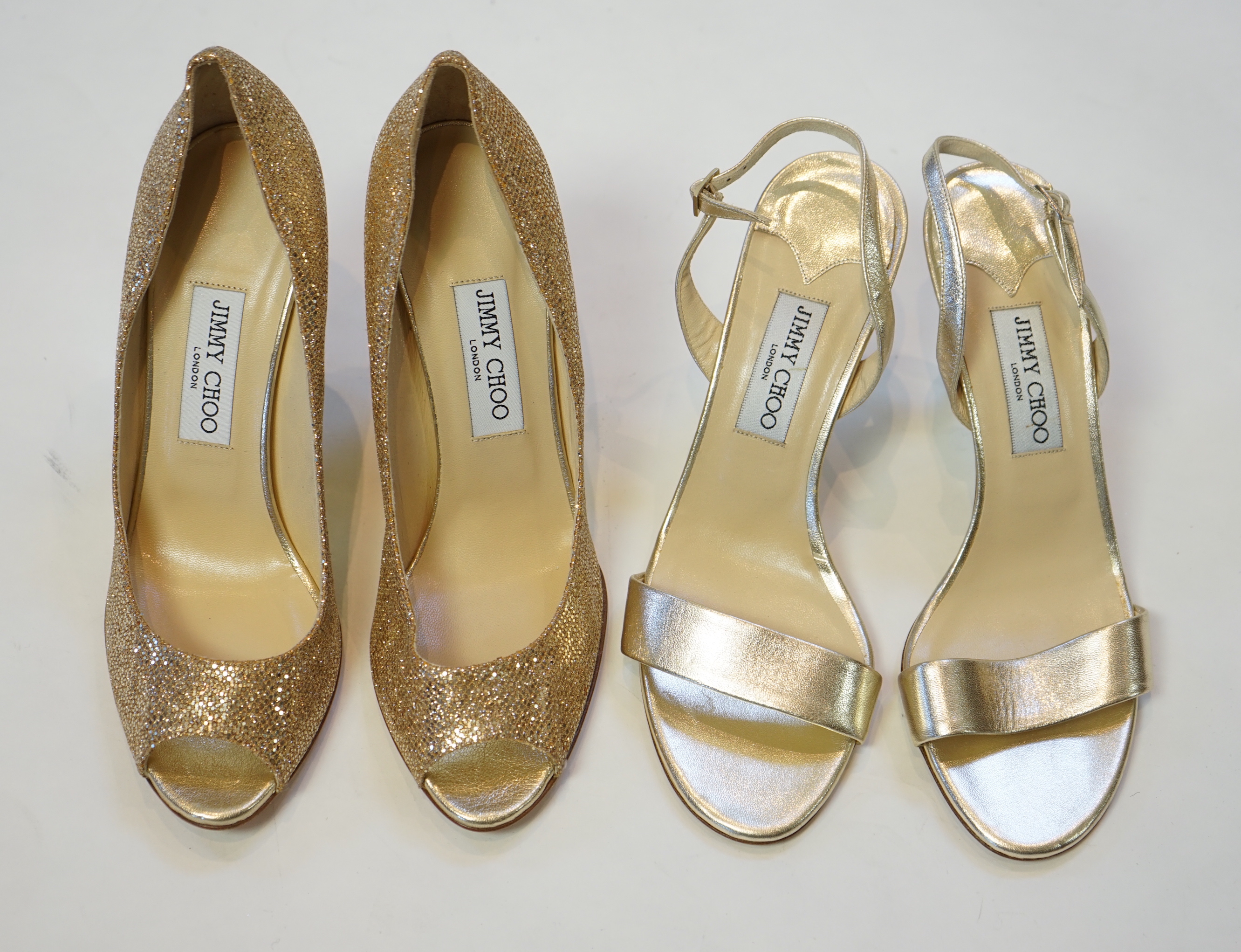 Two pairs of Jimmy Choo gold lady's heeled shoes, size EU 39